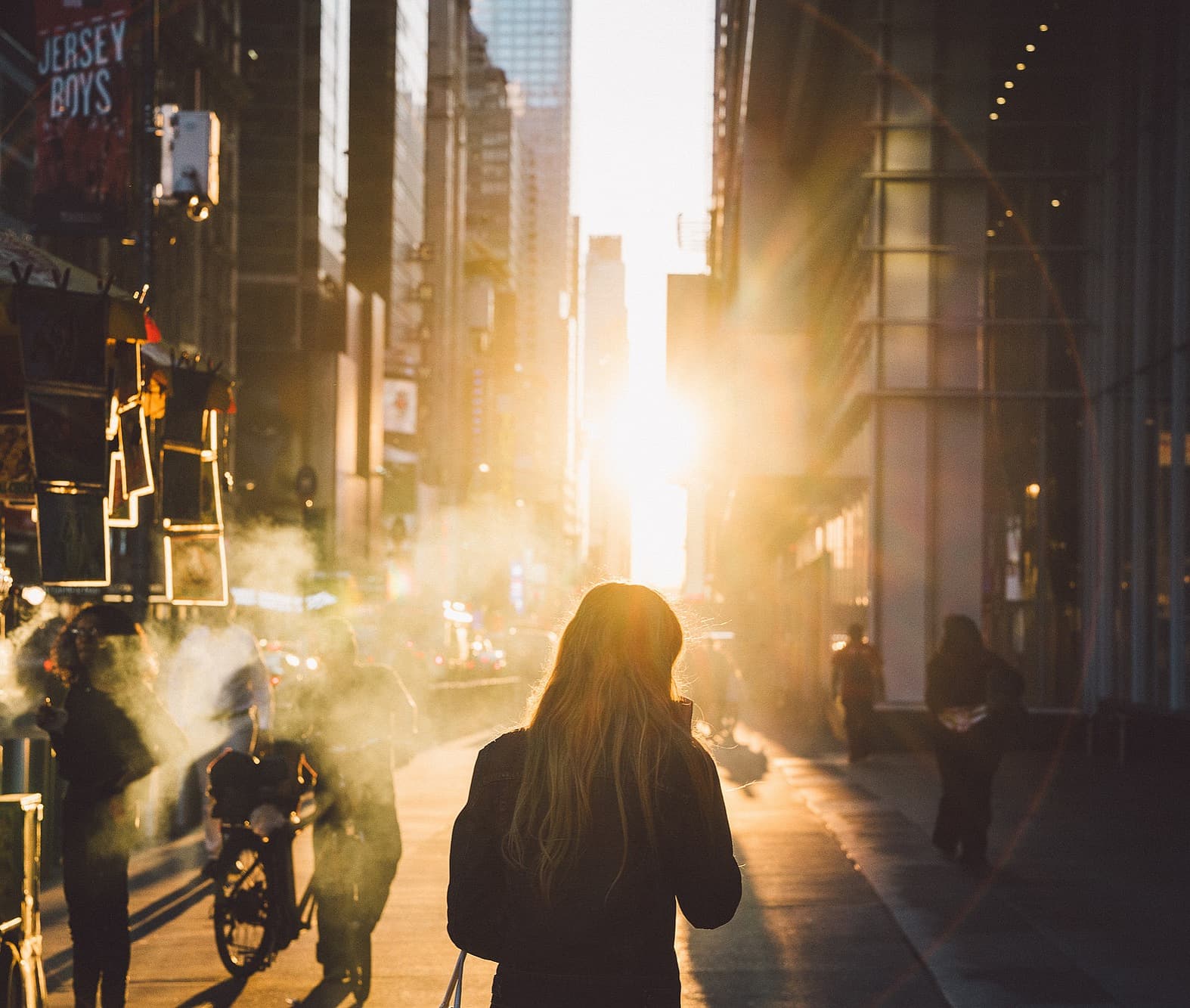NYC steam vent with dramatic street lighting
